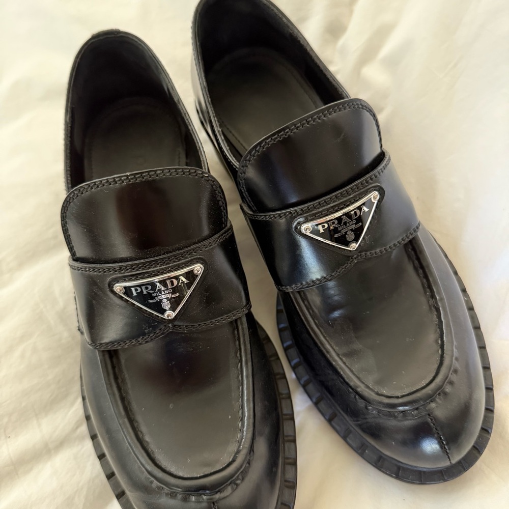 Prada Black Leather Loafers with Silver Logo and Platform Sole